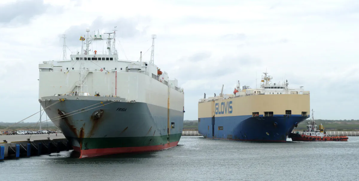 The Asian Sun car shipping carrier (R) and and carrier Frisia (L) are pictured at the main port of Sri Lanka's Chinese-built Hambantota port on June 6, 2012. (Ishara S.KODIKARA/AFP/GettyImages)