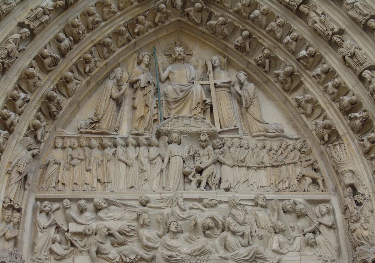 A details of the sculptures at the main portal to the Notre Dame Cathedral in Paris. (Wirestock Creators/Shutterstock)
