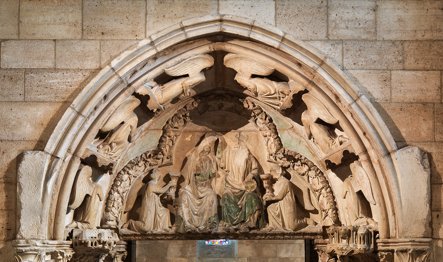 The tympanum above shows the Coronation of the Virgin in heaven, one of the most popular subjects in thirteenth-century French art.