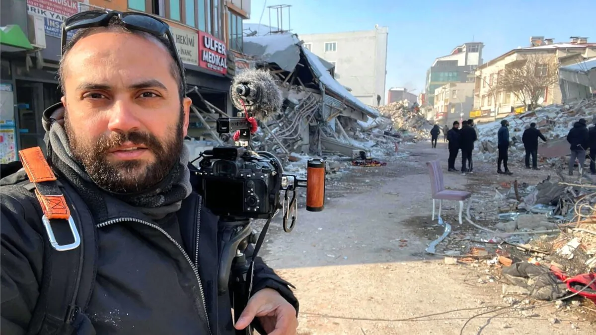 In this photo provided by Reuters, Issam Abdallah, a videographer for the news agency, poses for a selfie while working in Maras, Turkey, on Feb. 11, 2023. (Issam Abdallah/Reuters via AP)
