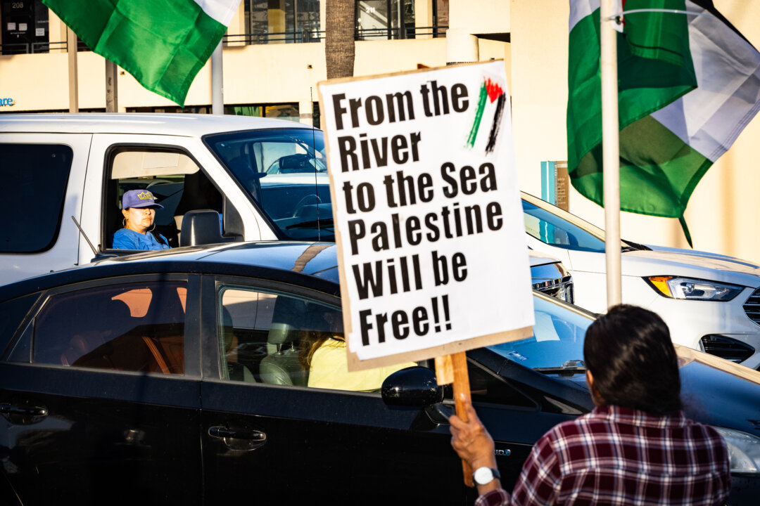 Protesters wave Palestinian flags in support of Palestinians and Hamas in Los Angeles on Oct. 12, 2023. (John Fredricks/The Epoch Times)