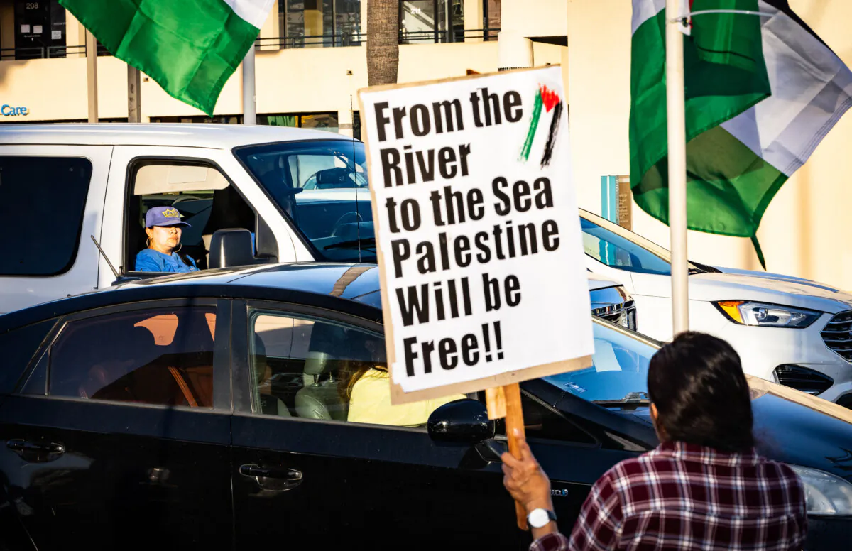 Protesters wave Palestinian flags in support of Palestinians and Hamas in Los Angeles on Oct. 12, 2023. (John Fredricks/The Epoch Times)