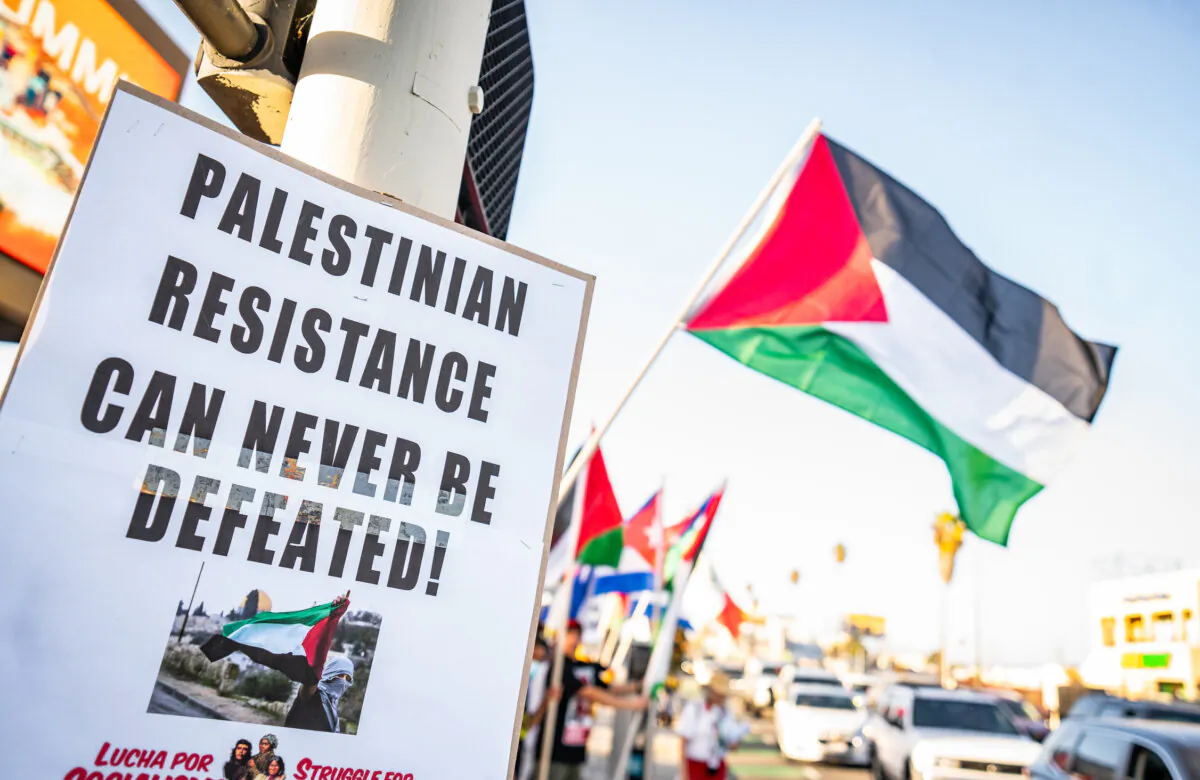 Protesters wave Palestinian and Latin American flags in support of Palestinians and Hamas in Los Angeles on Oct. 12, 2023. (John Fredricks/The Epoch Times)