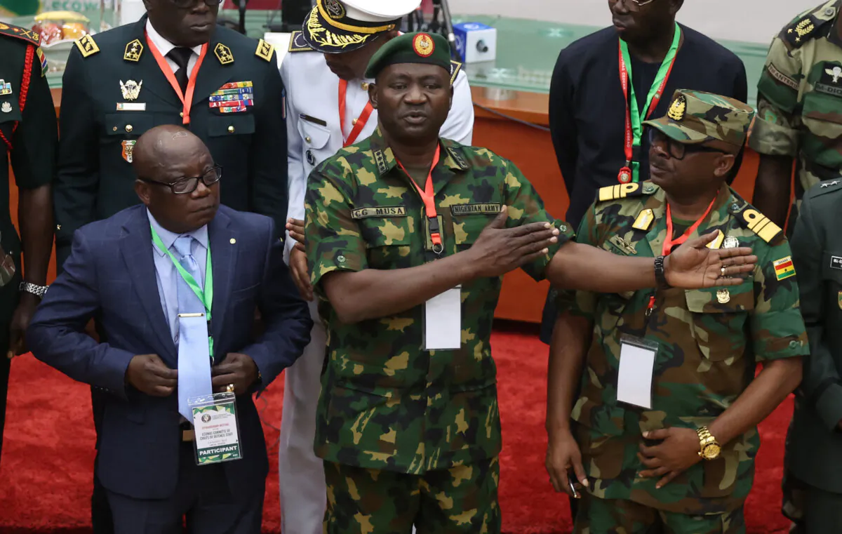 Commissioner for Political Affairs, Peace and Security of Economic Community of West African States (ECOWAS), Ambassador Abdel-Fatau Musah (L), Nigeria's Chief of Defence Staff, General Christopher Musa (C), and Ghana Chief of Defence Staff, Vice Admiral Seth Amoama (R), at a meeting to discuss the political unrest in the Republic of Niger, in Abuja, Nigeria, on Aug. 2, 2023. (Kola Sulaimon/AFP via Getty Images)