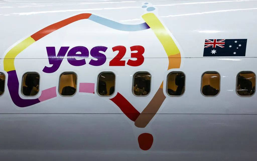 A Qantas Airways plane is seen decorated with the logo of the 'Yes' campaign for 'The Voice,' in Sydney, Australia, on Aug. 14, 2023. (David Gray/AFP via Getty Images)
