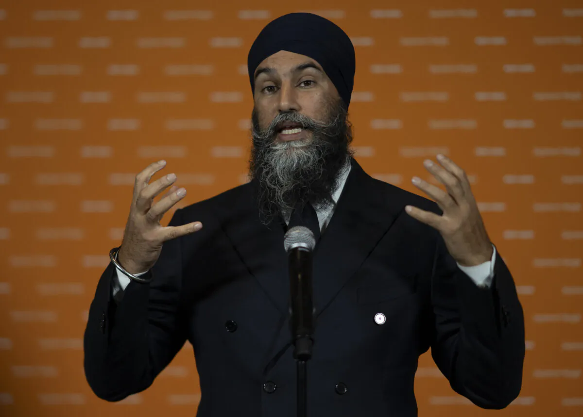 NDP Leader Jagmeet Singh speaks to the media after receiving a vote of support from 81 percent of the delegates present at the NDP Convention in Hamilton on Oct. 14, 2023. (The Canadian Press/Peter Power)