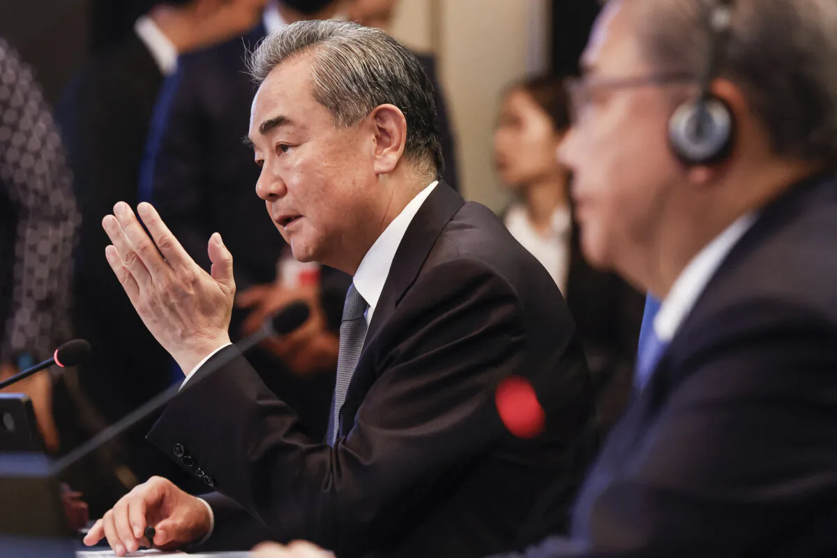 Director of the Office of the Foreign Affairs Commission of the Communist Party of China's Central Committee Wang Yi (L) speaks as South Korea's Foreign Minister Park Jin looks on during the Association of Southeast Asian Nations (ASEAN) Plus Three Foreign Ministers' Meeting in Jakarta, on July 13, 2023. (Mast Irham/AFP via Getty Images)