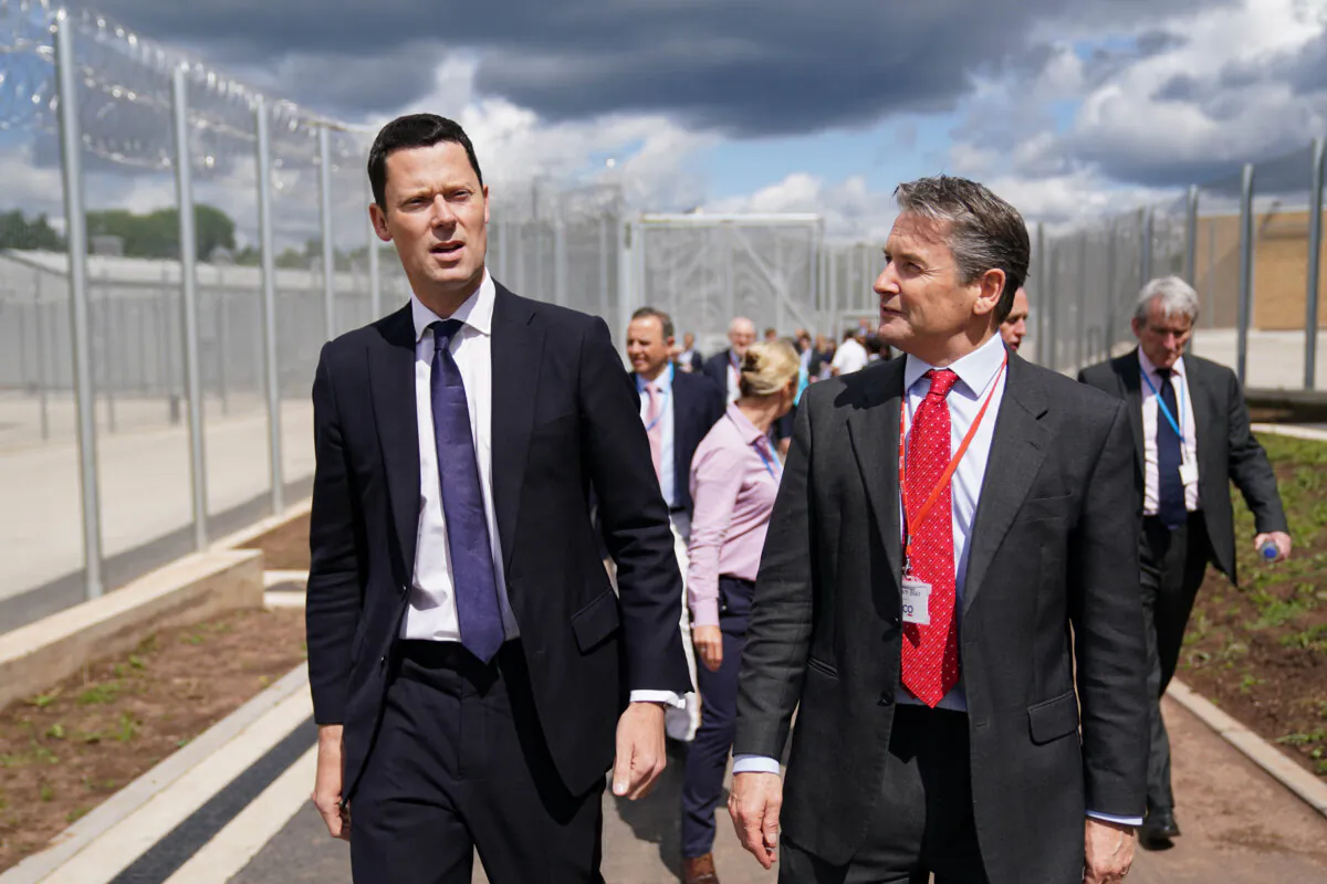 Justice Secretary Alex Chalk (L) attends the official opening of HMP Fosse Way, a Category C prison in Leicester, England, on June 29, 2023. (PA)