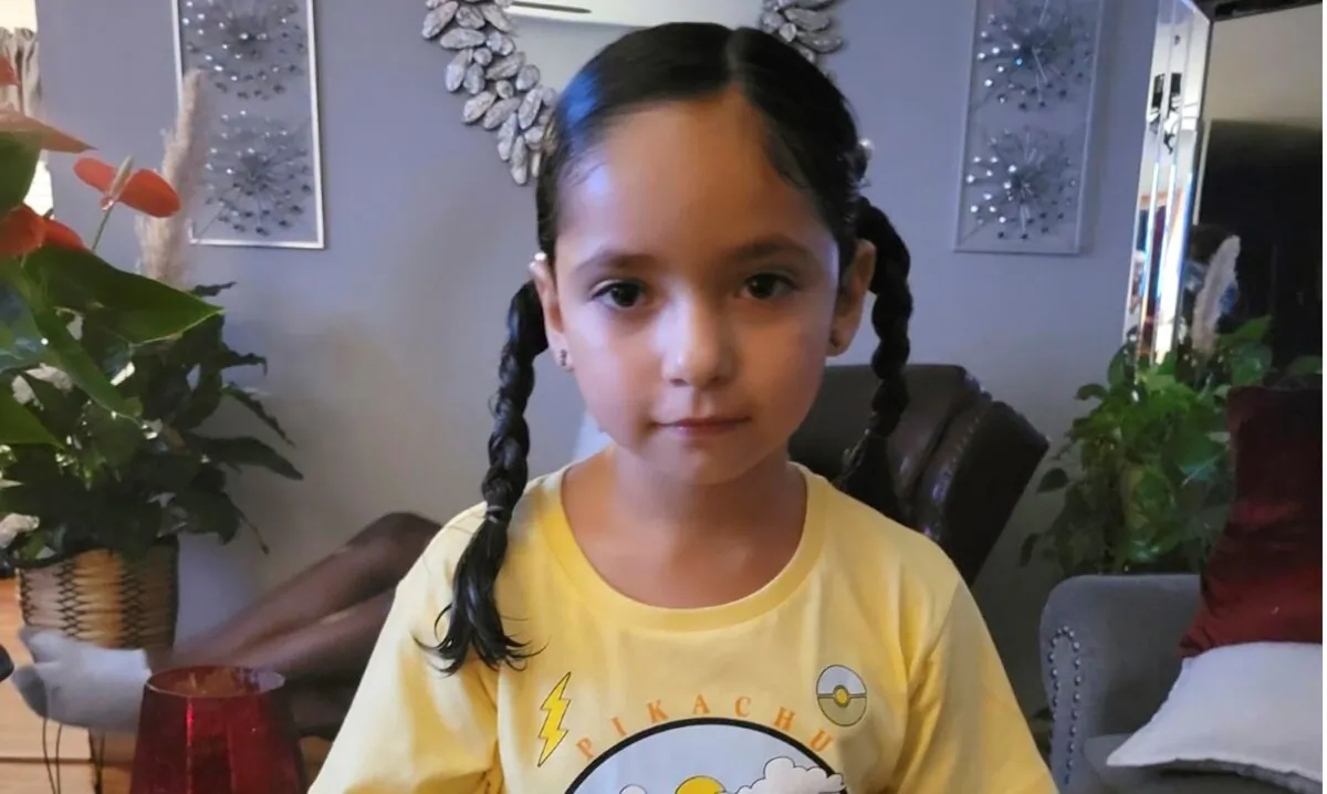 5-year-old Zoey after neighbors bought her a new outfit and cleaned her up in September 2023. (Desiree Myles via AP)