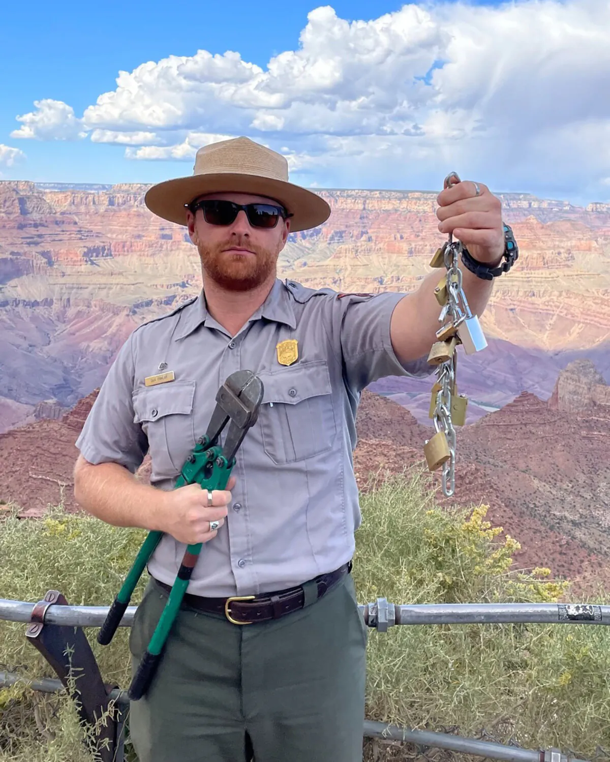 Park officials warn visitors against adding padlocks to fencing at the Grand Canyon and throwing the key into the canyon. (National Park Service/TNS)