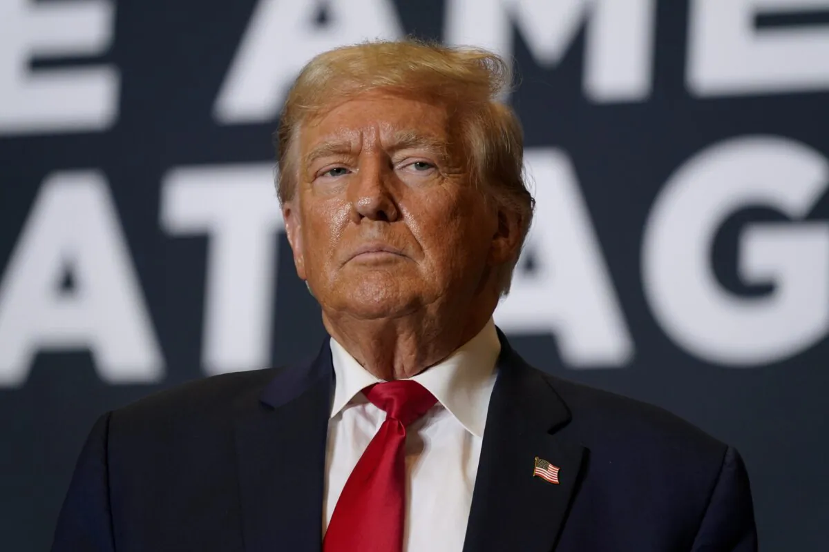 Former President Donald Trump arrives at a commit to caucus rally in Cedar Rapids, Iowa, on Oct. 7, 2023. (Charlie Neibergall/AP Photo)