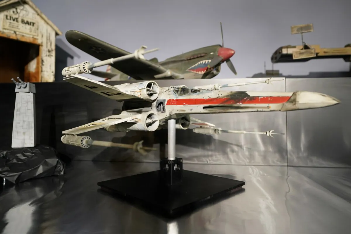 A miniature model called "Red Leader," a X-wing Starfighter from the 1977 film "Star War, Episode IV, A New Hope," sits on display at Heritage Auctions in Irving, Texas, on Aug. 30, 2023. (Tony Gutierrez/AP Photo)
