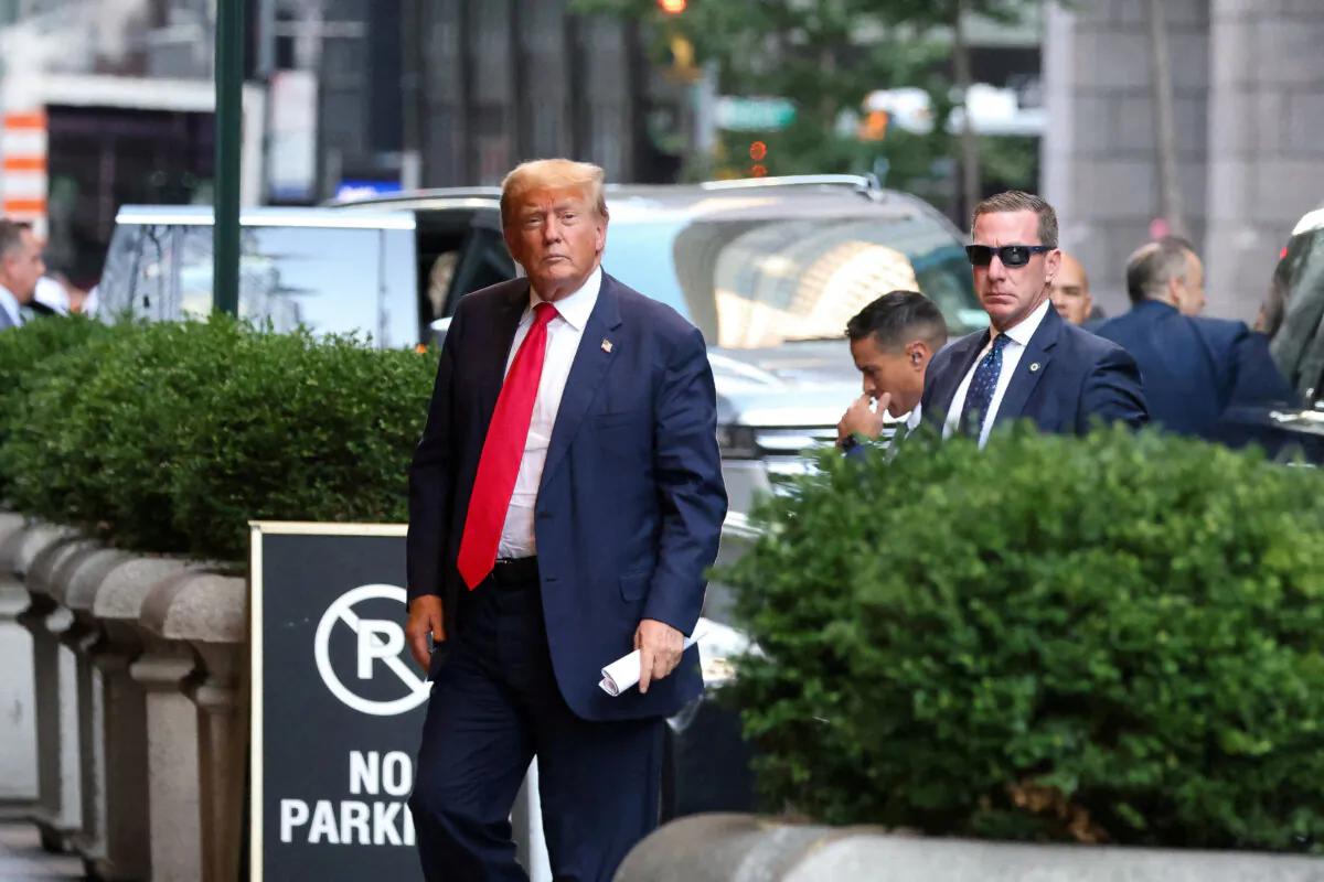 Former U.S. President Donald Trump walks outside as the trial of himself, his adult sons, the Trump Organization and others in a civil fraud case brought by state Attorney General Letitia James continues, in New York on Oct. 3, 2023. (Caitlin Ochs/Reuters)