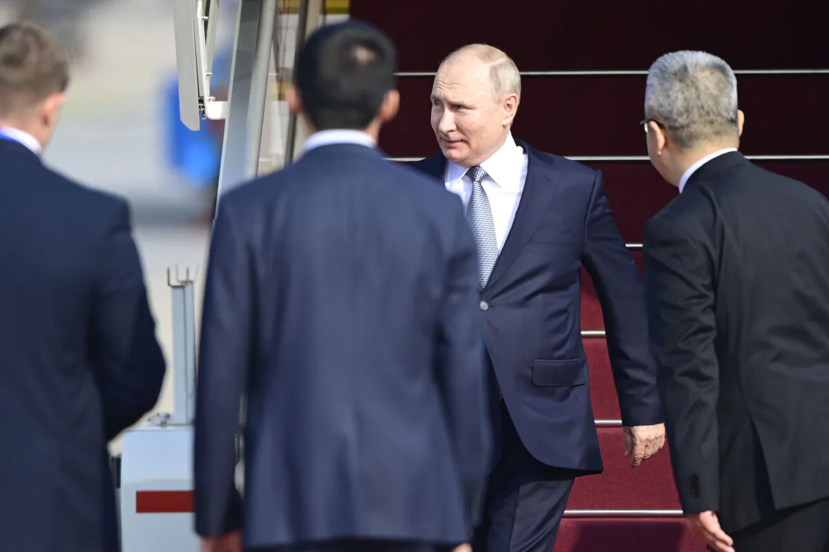 Russia's President Vladimir Putin arrives at Beijing Capital International Airport to attend the Third Belt and Road Forum, in Beijing, China, on Oct. 17, 2023. (Parker Song/Pool/Getty Images)