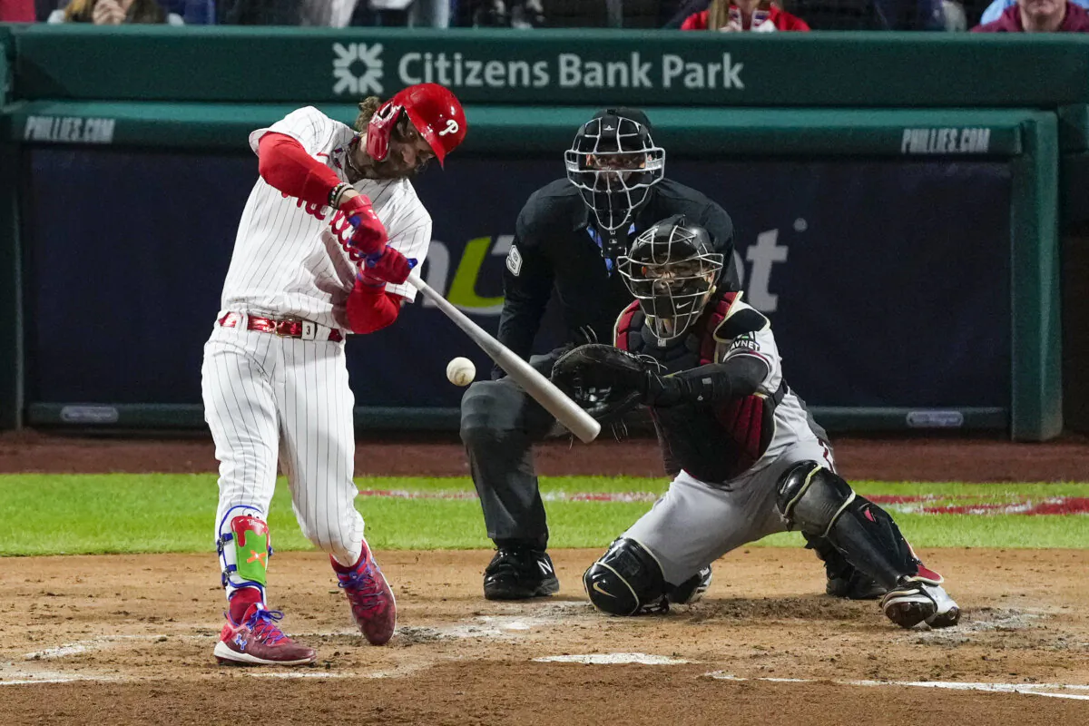 Philadelphia Phillies' Bryce Harper hits a RBI-single against the Arizona Diamondbacks during the third inning in Game 1 of the baseball NL Championship Series in Philadelphia on Oct. 16, 2023. (Matt Rourke/AP Photo)