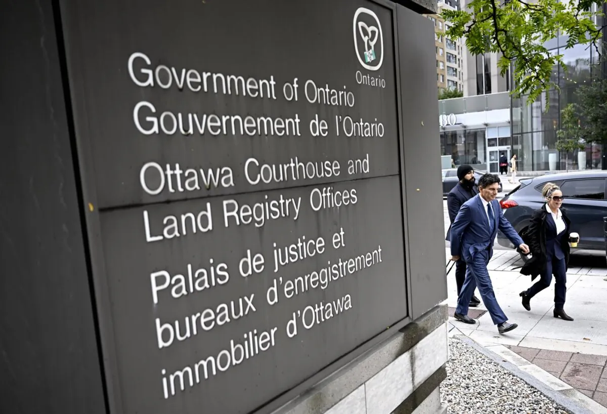 Tamara Lich and her lawyer Lawrence Greenspon arrive for her trial at the courthouse in Ottawa, on Sept. 19, 2023. (The Canadian Press/Justin Tang)