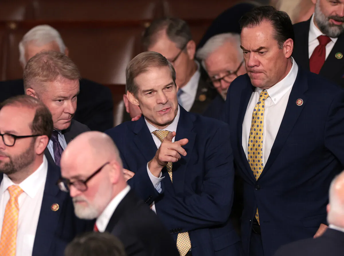 Rep. Jim Jordan (R-Ohio) (C) talks with fellow lawmakers as the House meets to elect a new speaker at the U.S. Capitol Building in Washington on Oct. 17, 2023. (Win McNamee/Getty Images)