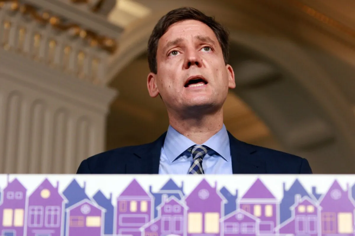 British Columbia Premier David Eby speaks during a press conference in the rotunda at the legislature in Victoria, on Oct. 16, 2023. (The Canadian Press/Chad Hipolito)