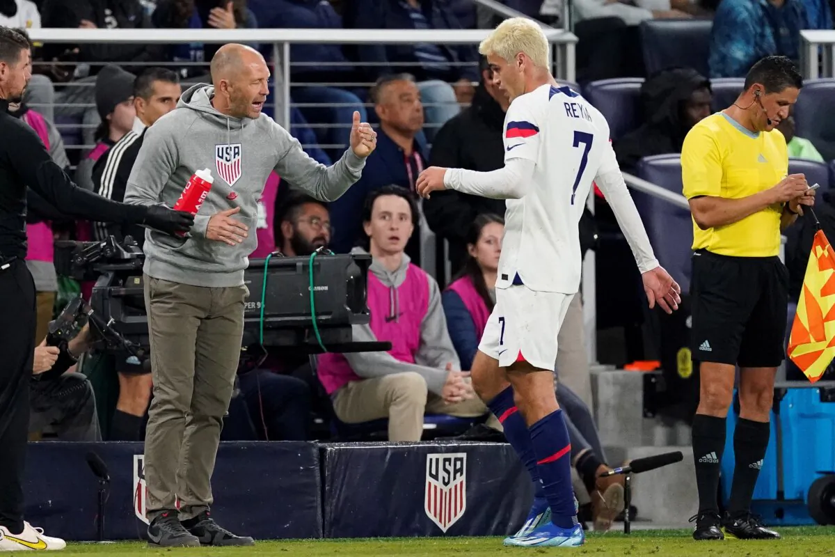 United States head coach Gregg Berhalter talks with midfielder Gio Reyna (7) during the first half of an international friendly soccer match against Ghana in Nashville, Tenn., on Oct. 17, 2023. (George Walker IV/AP Photo)