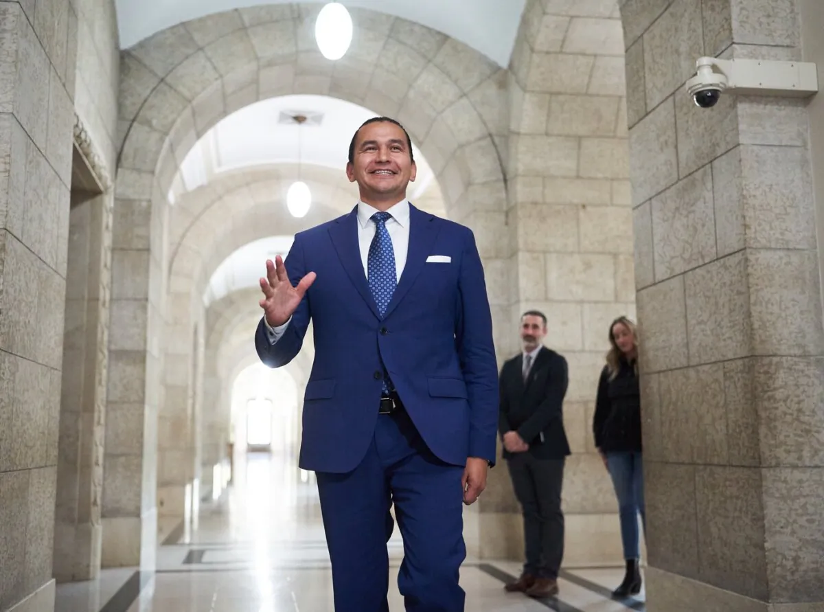 Manitoba's new premier Wab Kinew walks to the premier's office in Winnipeg, on Oct. 5, 2023. (The Canadian Press/David Lipnowski)
