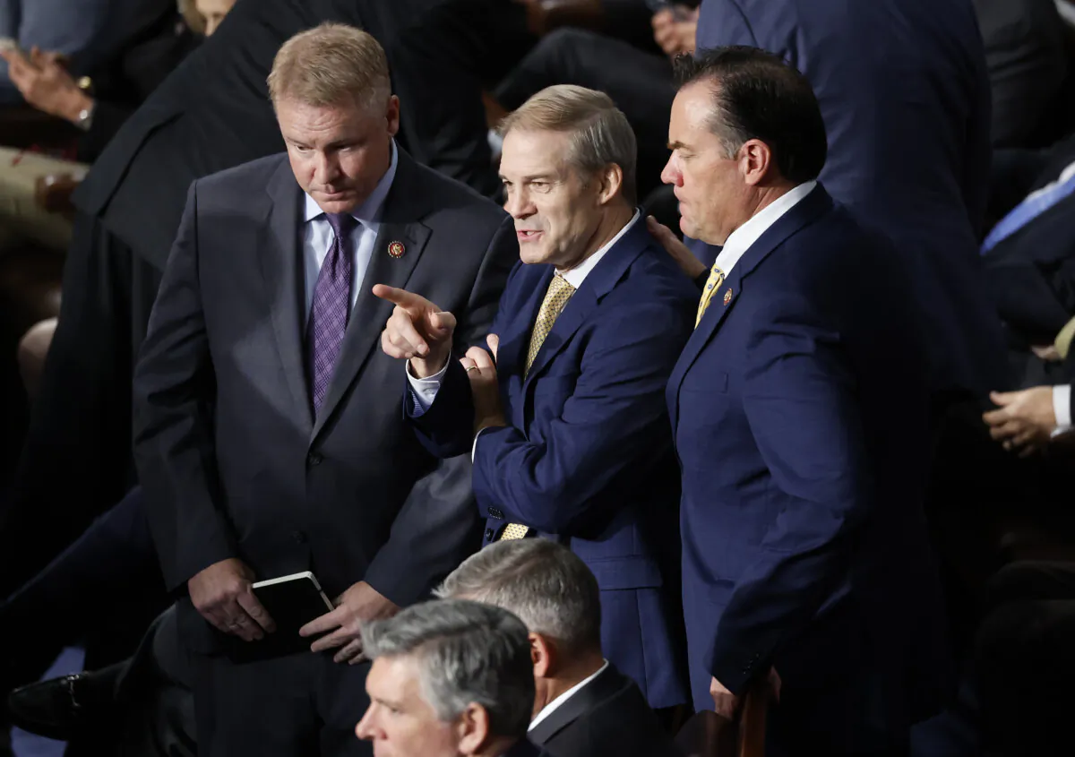 Rep. Jim Jordan (R-Ohio) (C) talks with fellow lawmakers and staff as the House of Representatives meets to elect a new Speaker of the House at the U.S. Capitol Building on Oct. 17, 2023. (Chip Somodevilla/Getty Images)