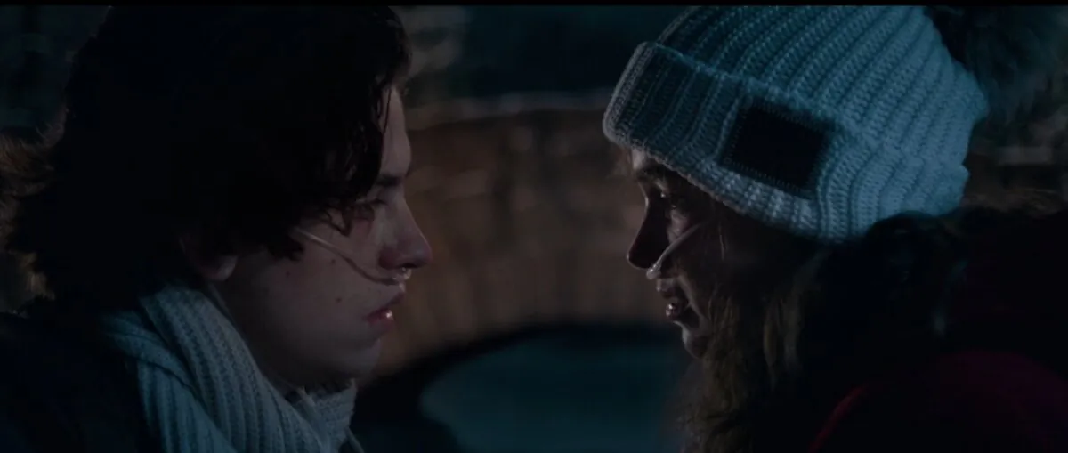 Love blossoms between Will (Cole Sprouse) and Stella (Haley Lu Richardson), in “Five Feet Apart.” (Lionsgate)