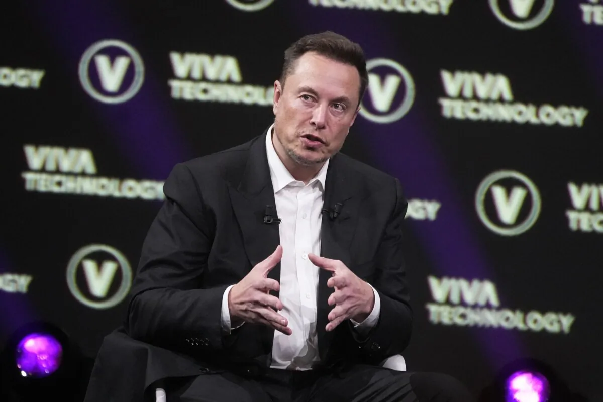 Elon Musk, who owns Twitter, Tesla and SpaceX, speaks at the Vivatech fair in Paris on June 16, 2023. (Michel Euler/AP Photo)