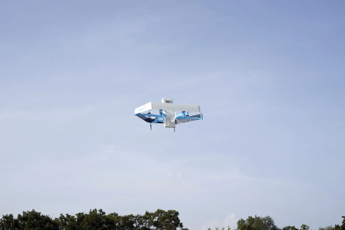 A drone delivering prescription drugs in College Station, Texas. (Amazon via AP)