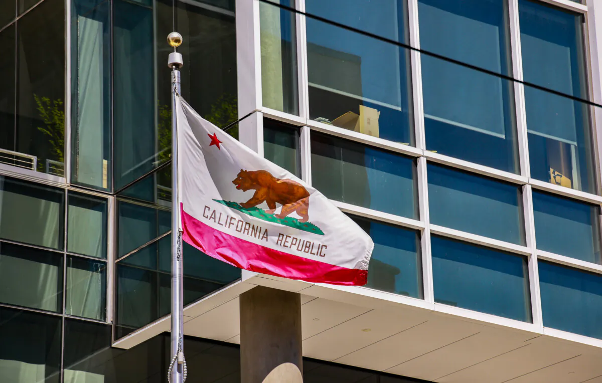 The California state flag flies in Sacramento, Calif., on Aug. 29, 2023. (John Fredricks/The Epoch Times)