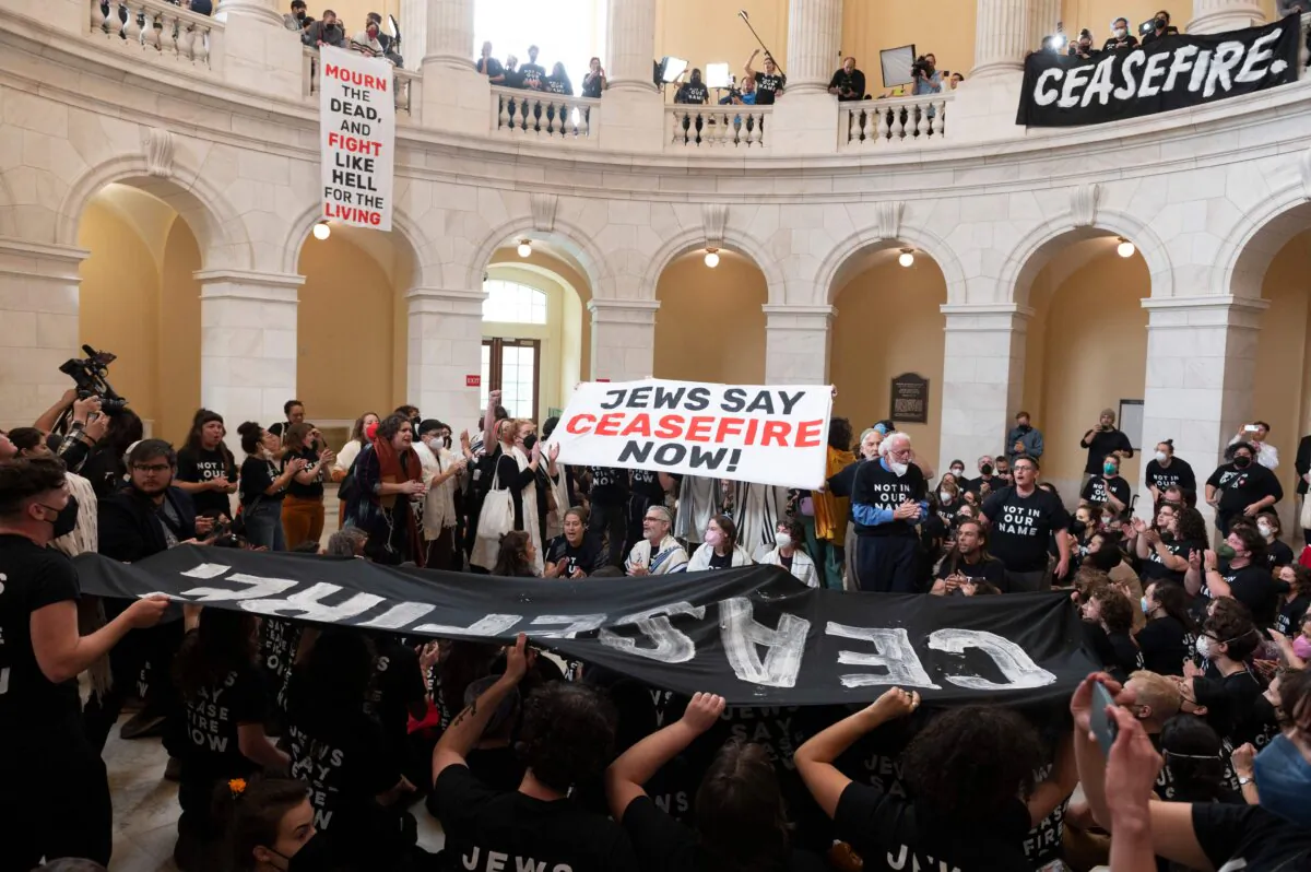 Members of the U.S. Jewish community protest against the Israeli military operation in Gaza, inside the Cannon building in the U.S. Capitol in Washington on Oct. 18, 2023. (Roberto Schmidt/AFP via Getty Images)