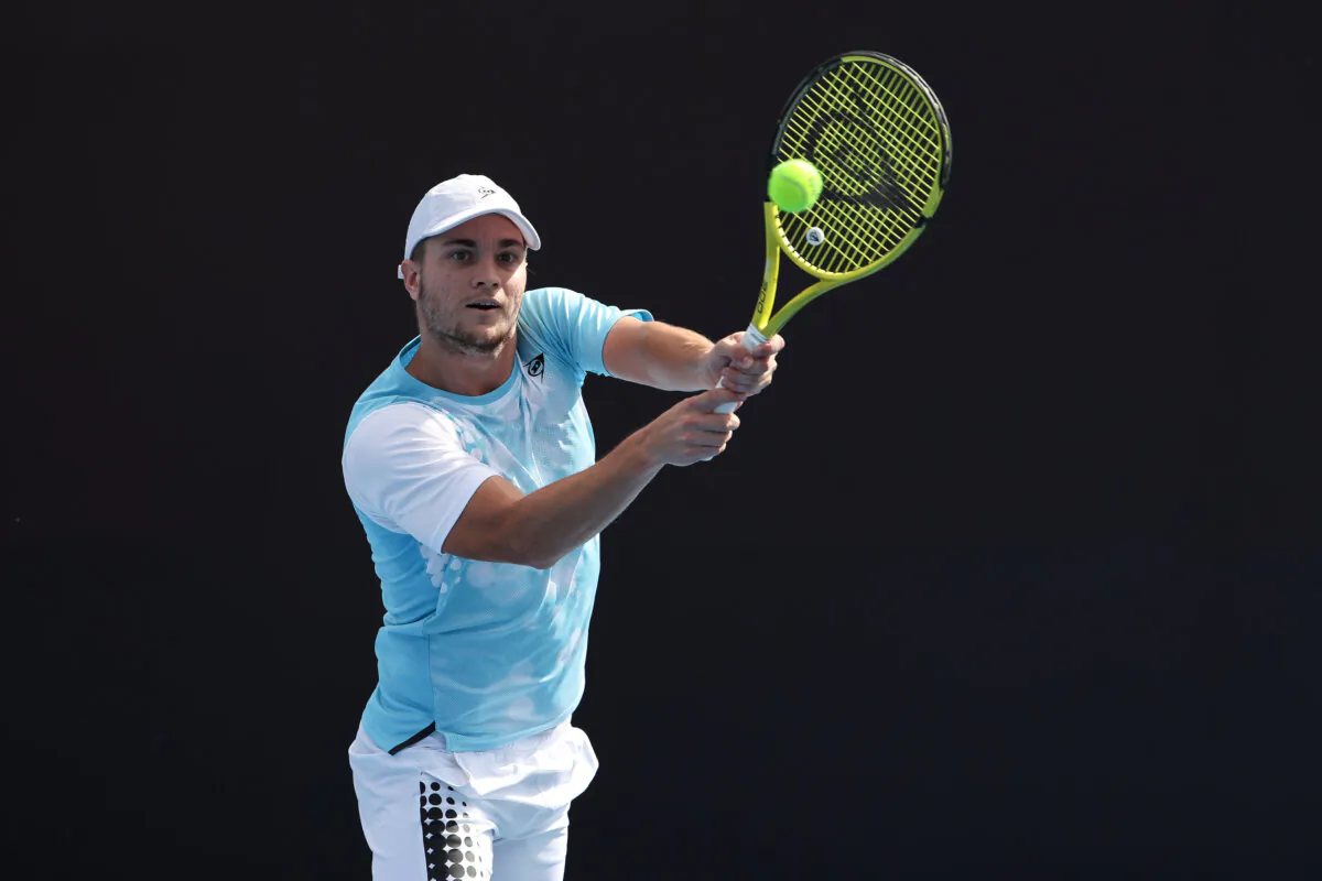 Miomir Kecmanovic of Serbia returns a shot against Yannick Hanfmann of Germany on day two of the 2023 China Open in Beijing on Sept. 27, 2023. (Emmanuel Wong/Getty Images)