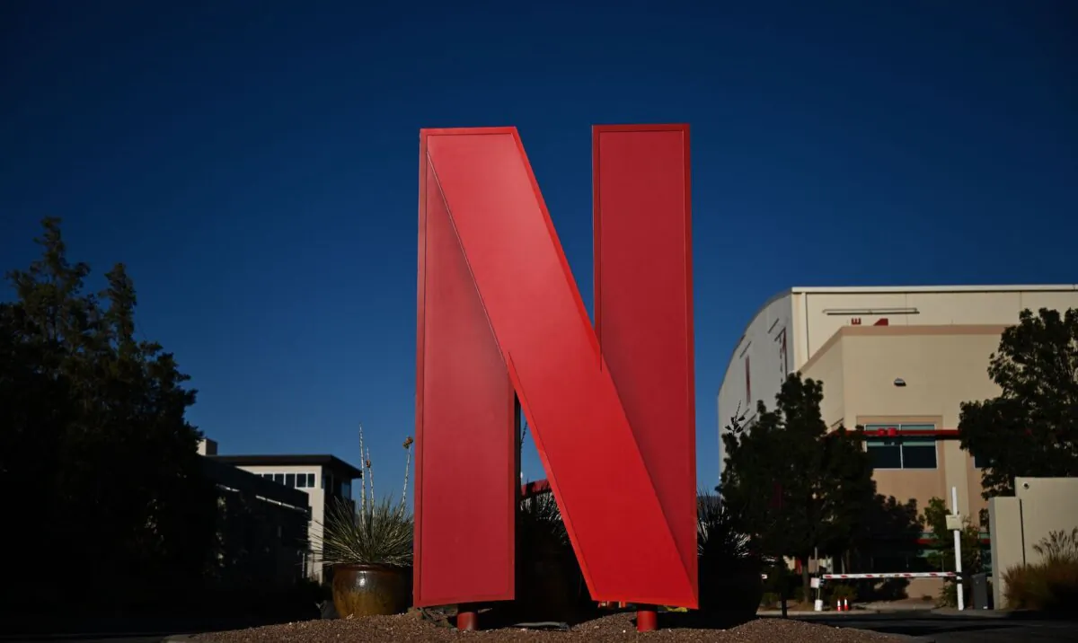 The Netflix logo at the entrance to Netflix Albuquerque Studios film and television production studio lot in Albuquerque, N.M., on Oct.13, 2023. (Patrick T. Fallon/AFP via Getty Images)