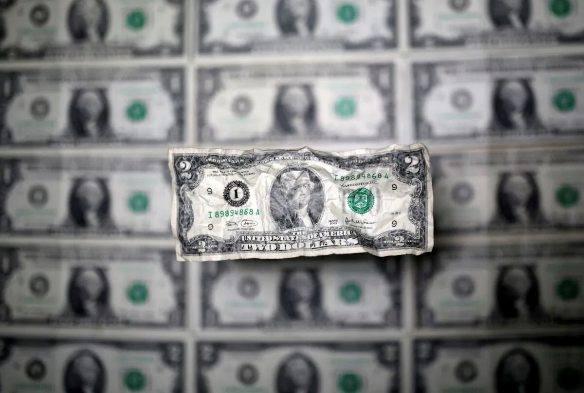U.S. dollar banknote is seen in this picture illustration taken on May 3, 2018. (Dado Ruvic/Reuters)