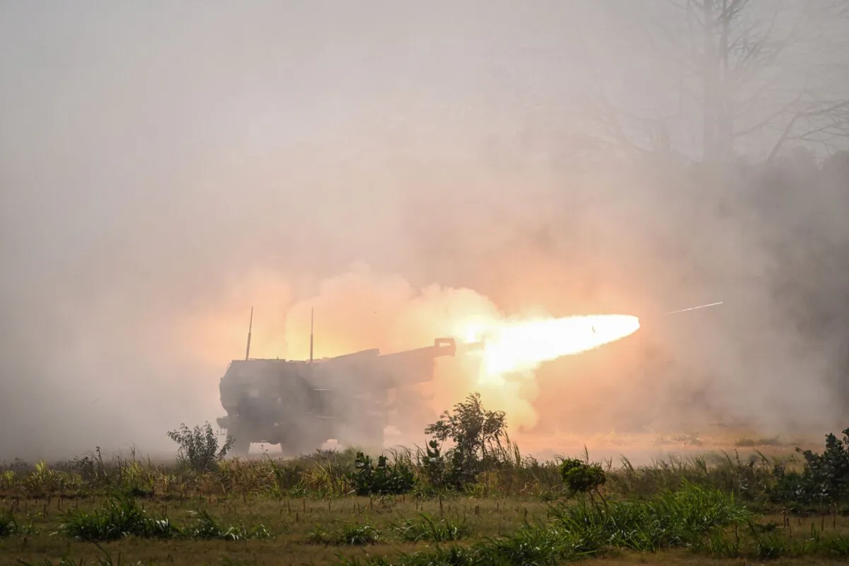 Members of the US army launch the M142 High Mobility Artillery Rocket Systems during the Super Garuda Shield 2023 joint military exercise including Indonesia, Japan, Singapore, Australia and the US in Situbondo, East Java on Sept. 11, 2023. (Juni Kriswanto/AFP via Getty Images)
