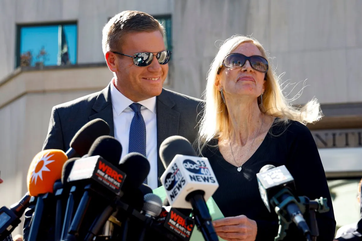 Beth Holloway speaks to media with her son Matt Holloway after the appearance of Joran van der Sloot outside the Hugo L. Black Federal Courthouse in Birmingham, Ala., on Oct. 18, 2023. (Butch Dill/AP Photo)