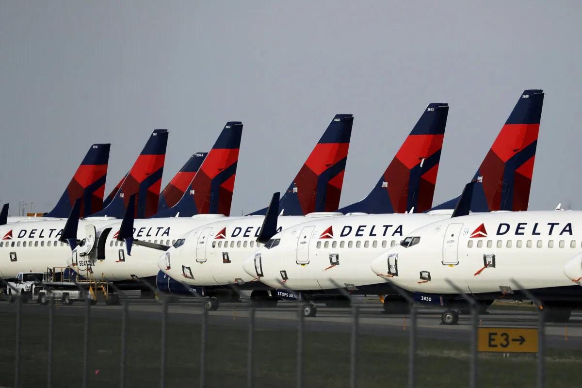 Several dozen Delta Air Lines jets are parked at Kansas City International Airport in Kansas City, Mo., on April 1, 2020. (Charlie Riedel/AP Photo)