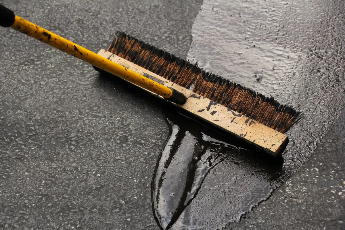 Seal the asphalt driveway within six months after it was laid. (vm2002/Shutterstock)