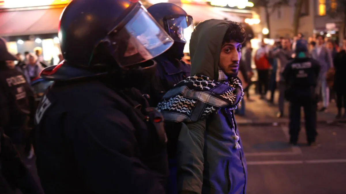 Riot police detain a man at a gathering of pro-Palestinian demonstrators on Sonnenallee in Arab-heavy Neukoelln district in Berlin, Germany, on Oct. 18, 2023. (Sean Gallup/Getty Images)