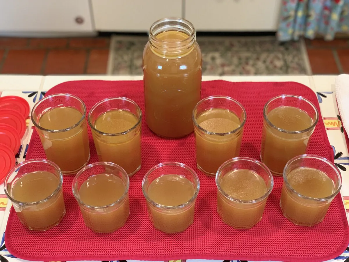Jars of homemade chicken bone broth. (Mary Bryant Shrader)