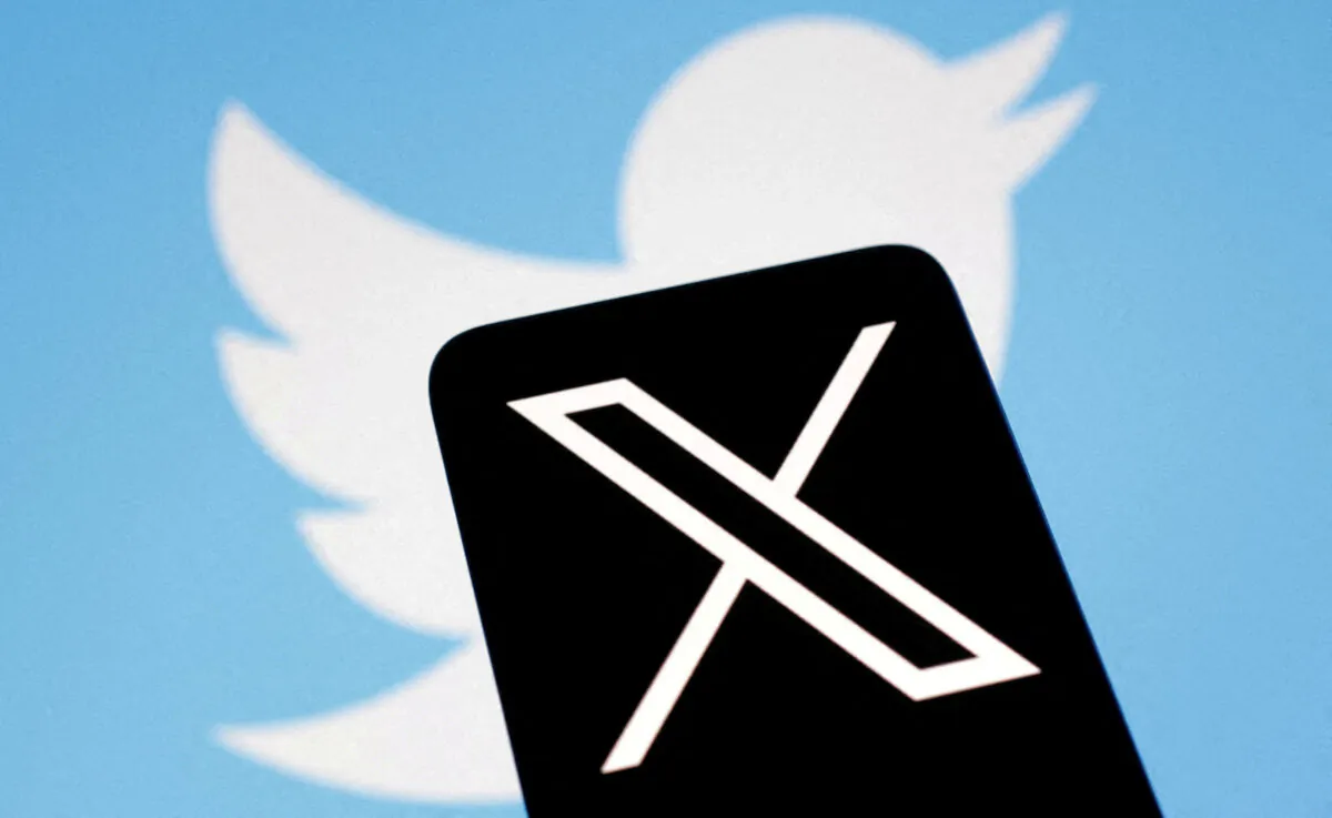 The logo for social media platform X, following the rebranding of Twitter, is seen covering the old logo in an illustration taken on July 24, 2023. (Dado Ruvic/Reuters)