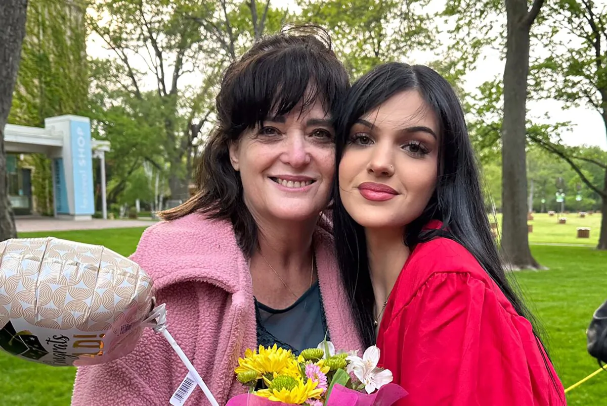 Judith Raanan (L) and her daughter Natalie, 17, after Natalie's recent high school graduation. (Raanan Family via AP)