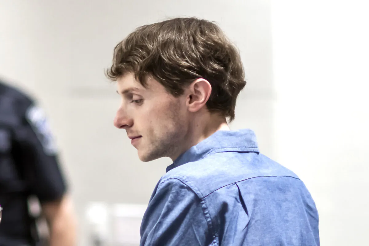 Logan Clegg talks with defense attorney Maya Dominguez at his trial at Merrimack County Superior Court, in Concord, N.H., on Oct. 3, 2023. (Geoff Forester/Pool/The Concord Monitor via AP)
