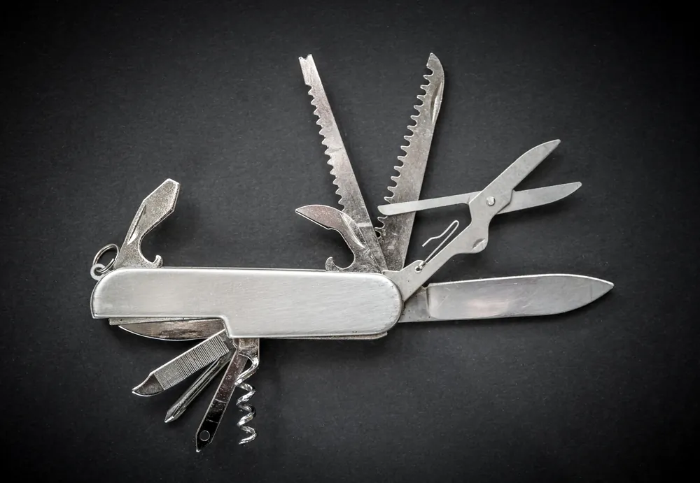 Even a very basic Swiss Army Knife model tucked into a pocket, briefcase, or purse can be a lifesaver. (Daboost/Shutterstock)