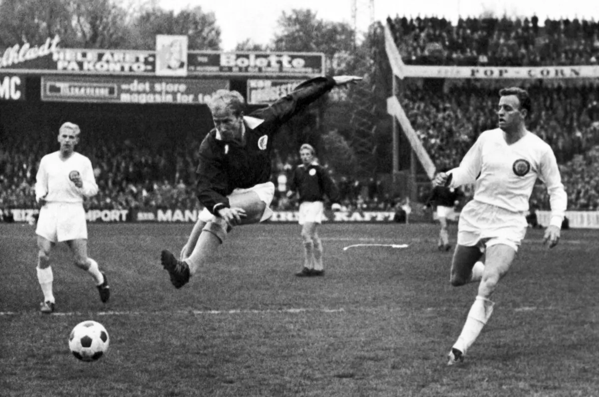 England's Bobby Charlton, plays for the Rest of Europe against Scandinavia, in a show soccer match to celebrate the 75th anniversary of the Danish Football Association, in Copenhagen, Denmark. (File/AP Photo)