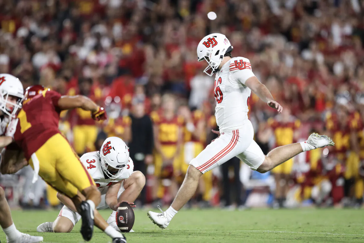 Cole Becker (36) of the Utah Utes kicks a field goal to win the game against the USC Trojans at the Memorial Coliseum in Los Angeles on Oct. 21, 2023. (Meg Oliphant/Getty Images)