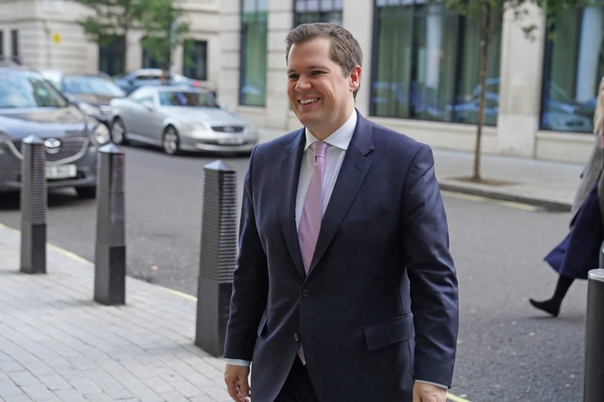 Immigration Minister Robert Jenrick arrives at BBC Broadcasting House in London, to appear on the BBC One current affairs programme "Sunday with Laura Kuenssberg" on Oct. 22, 2023. (Stefan Rousseau/PA Wire)