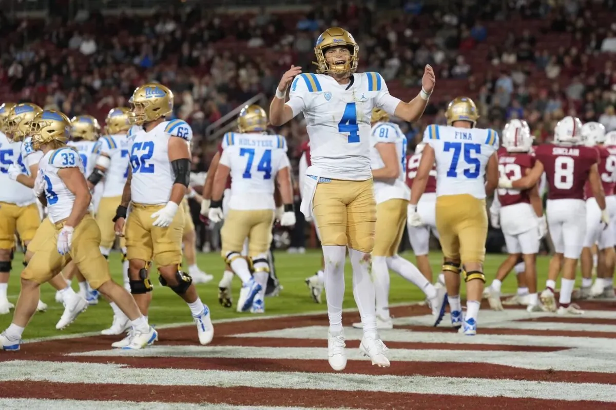 UCLA Bruins quarterback Ethan Garbers (4) reacts after a touchdown by running back Carson Steele (not shown) during the second quarter against the Stanford Cardinal at Stanford Stadium in Stanford, Calif., on Oct. 21, 2023. (Darren Yamashita/USA TODAY Sports via Field Level Media)