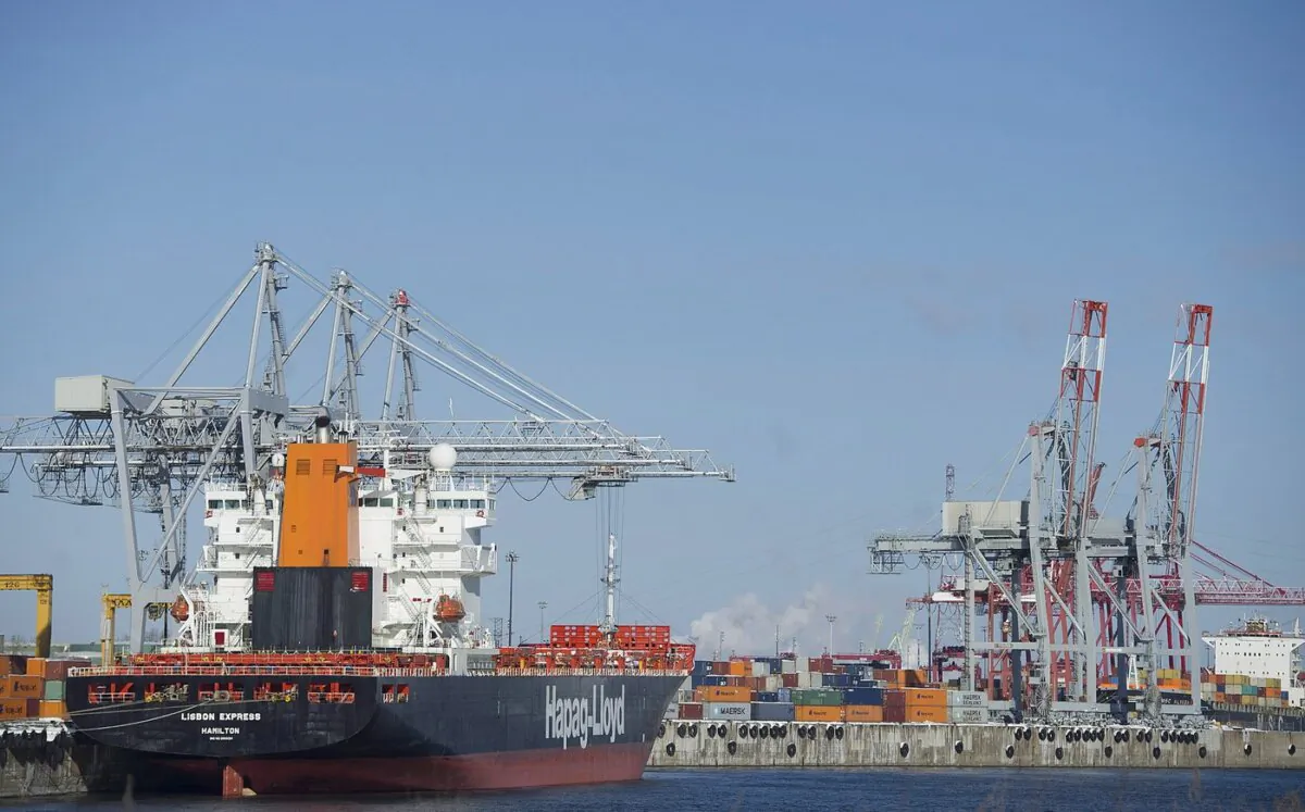 Container ships are shown in the Port of Montreal on Jan. 4, 2016. (The Canadian Press/Graham Hughes)