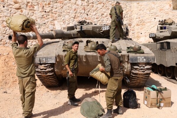 Israeli soldiers make preparations