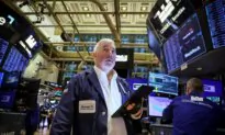 Wall Street Rises as Yields Slip, Traders Assess Economic Data